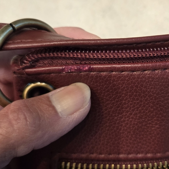 Small burgundy cross body purse with several zipper pockets. - Picture 5 of 7